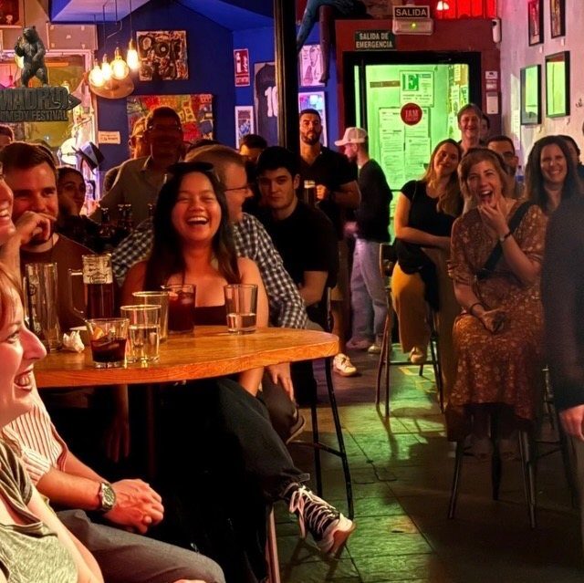 Audience laughing at a No Offense, But... show